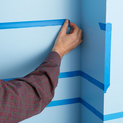 laying out the colorful areas with painter's tape