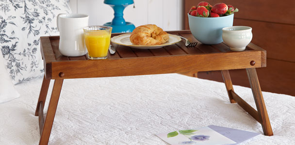 serving tray standing on a bed as an example for How to Build Folding Serving Tray