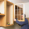 tom silva reattaching paned doors to wood kitchen cabinet