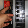 woman turning power on