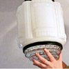 secure the glass shade of the vintage fixture