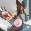 Brush epoxy primer on the exposed wood