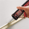 filling gaps and holes in the wall with caulk