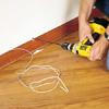 Drilling a hole into the adjoining room