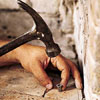 Inserting lead anchors for screws.