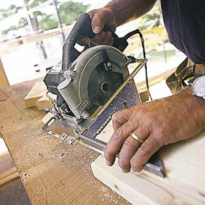 cutting the studs for a partition wall