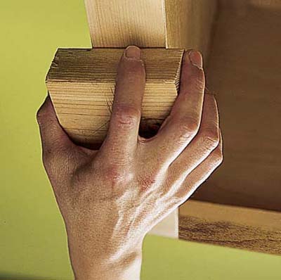 Pressing down the veneer.