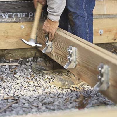 Tom Silva biuliding an on-grade deck
