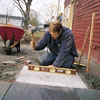 laying the stones for a patio