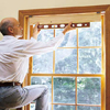 checking the window shade's brackets for level