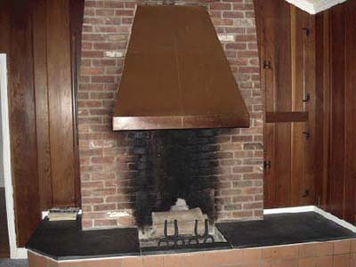 fireplace built on the exterior side of the chimney