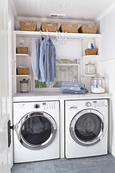 bath and laundry after remodel with marble countertops laundry area